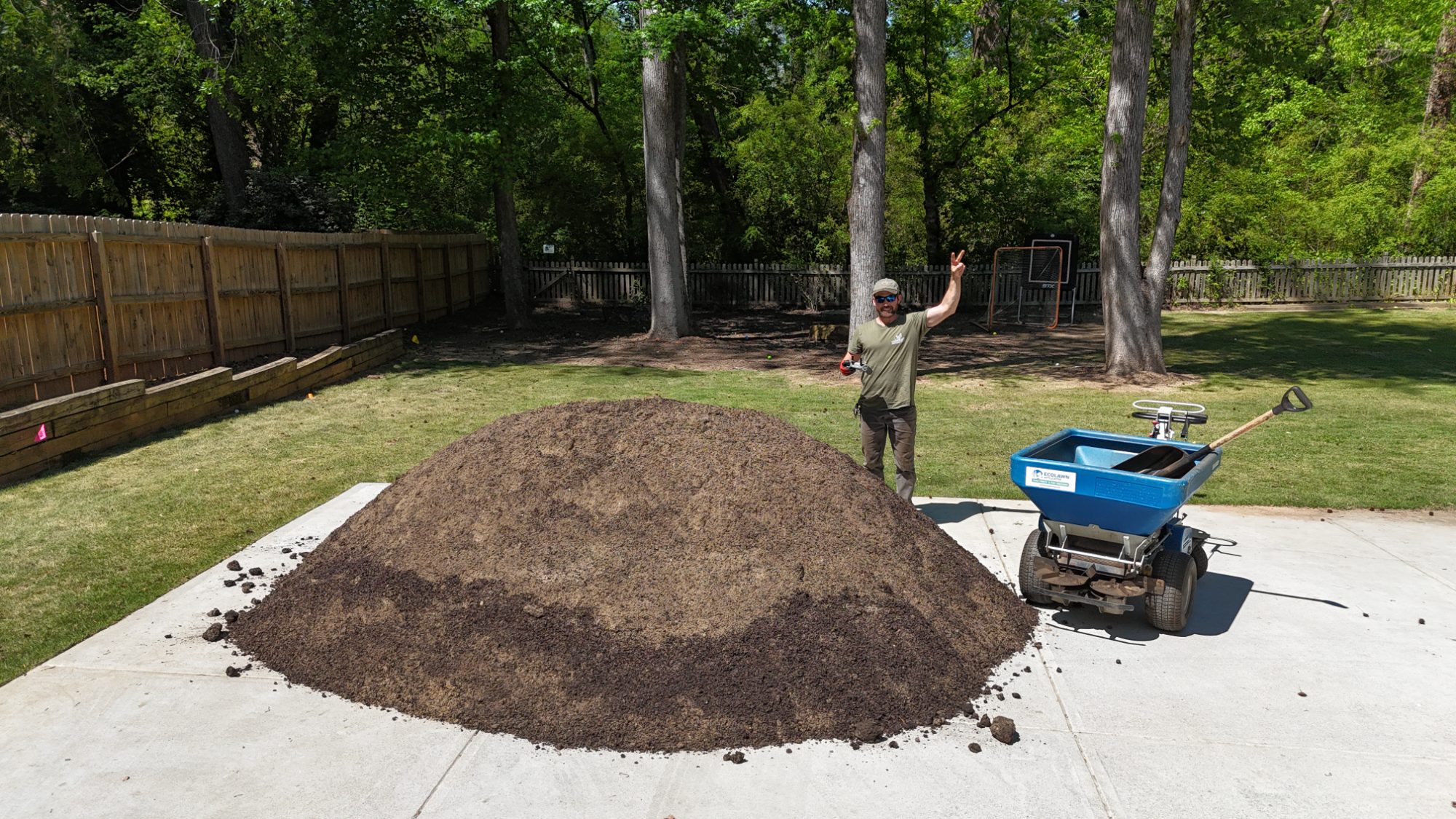 Compost and sand topdressing spread across an Atlanta lawn
